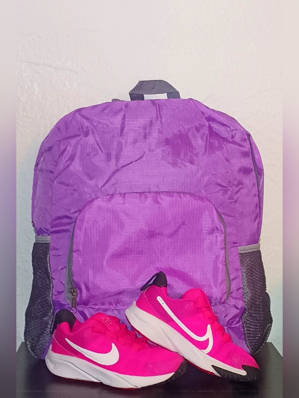Nike Star Runner 4 with 17 inch purple backpack.